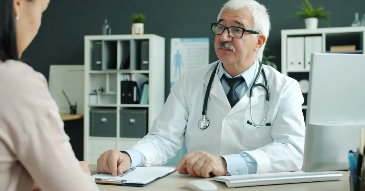 A doctor consulting with a patient